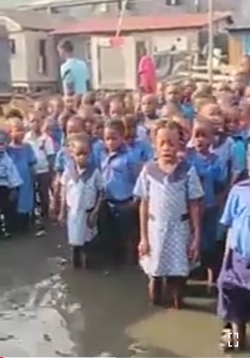 So Painful As Pupils Sing National Anthem In A Flooded School