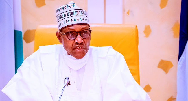 PMB Signs Climate Change, AMCON (Amendment) Bills Into Law