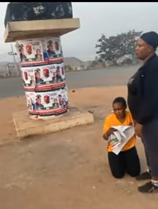 Video, Photos Of Lady Caught Destroying Tinubu’s Posters In Enugu