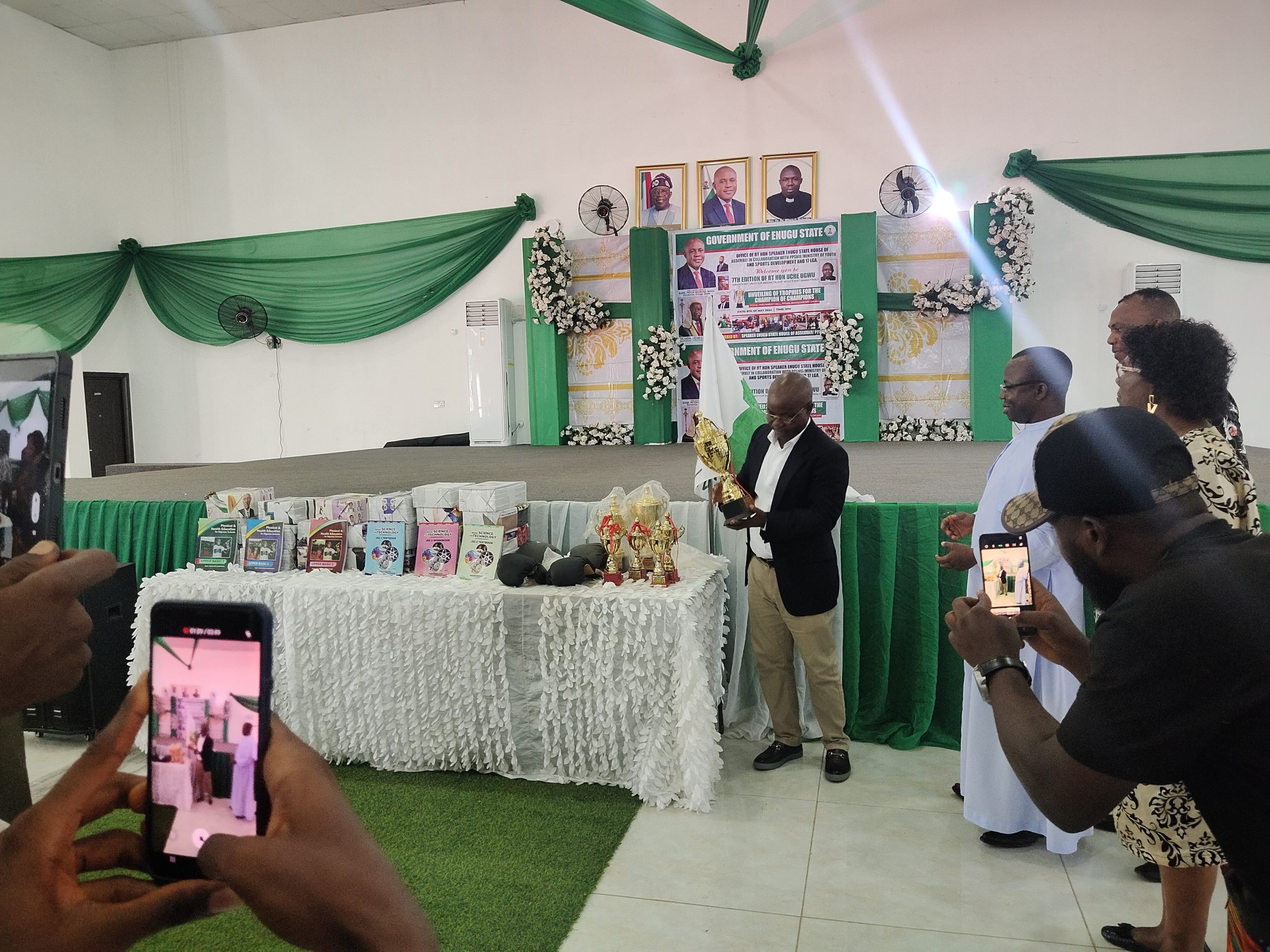 The speaker, Hon Uche Ugwu, unveiling the trophies 