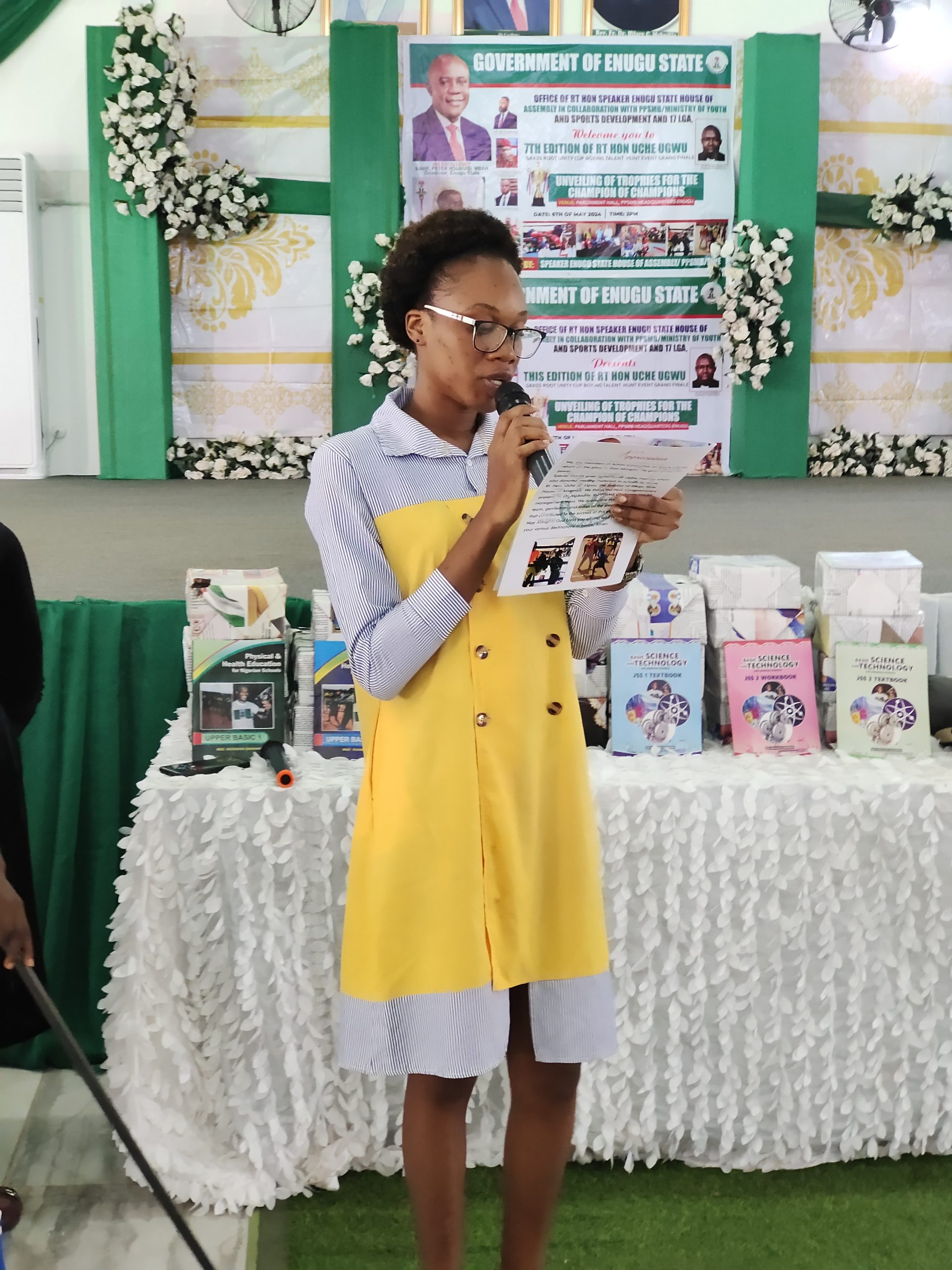 Amirah Ikechukwu Okoronkwo throwing light on the PHE textbook