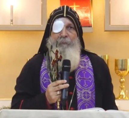 Bishop who was repeatedly stabbed while preaching returns to the pulpit with an eye patch weeks after the attack (video)