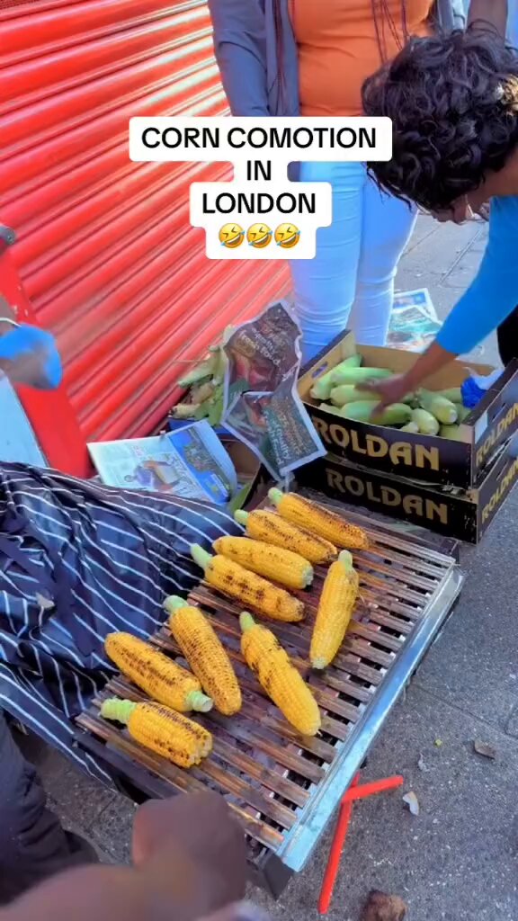 See Moment Nigerian Man Sells Roasted Corn In London